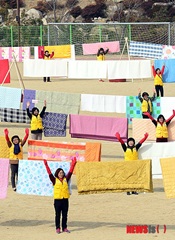 春を前に布団洗いボランティア