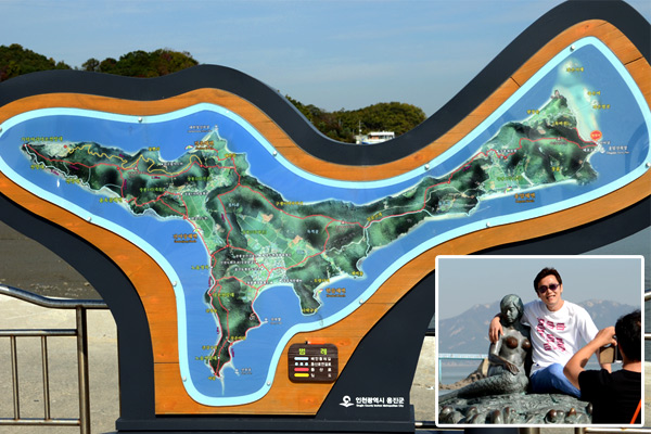長峰島の船着き場で見ることができる地図と人魚の像。